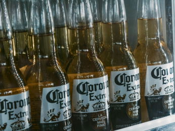 a-refrigerator-filled-with-lots-of-bottles-of-beer.jpg a refrigerator filled with lots of bottles of beer